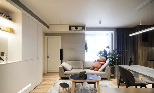 他把电视墙设在过道,完工后堪比“多间房”,全屋挑不出半点毛病(图13) 玄关吧台设计_72㎡小窝改造_装修效果图大全2025图片电视墙