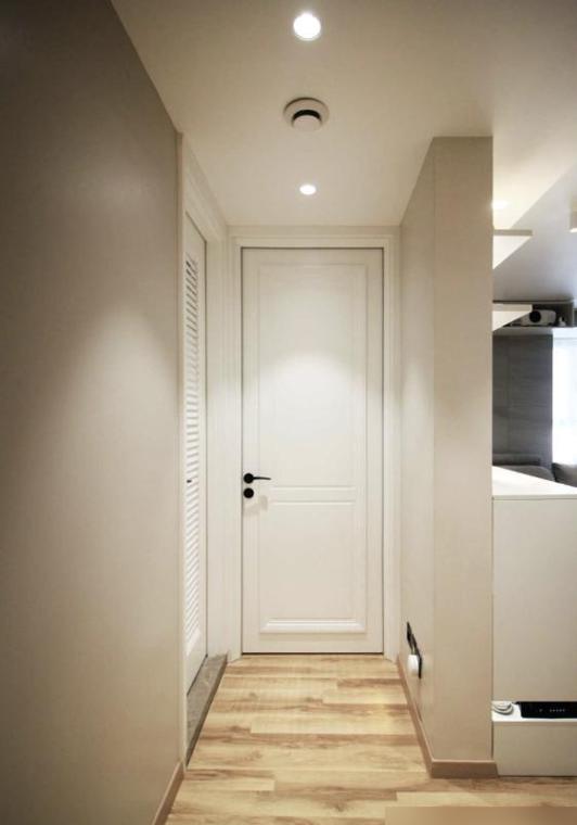 他把电视墙设在过道,完工后堪比“多间房”,全屋挑不出半点毛病(图5) 玄关吧台设计_72㎡小窝改造_装修效果图大全2025图片电视墙