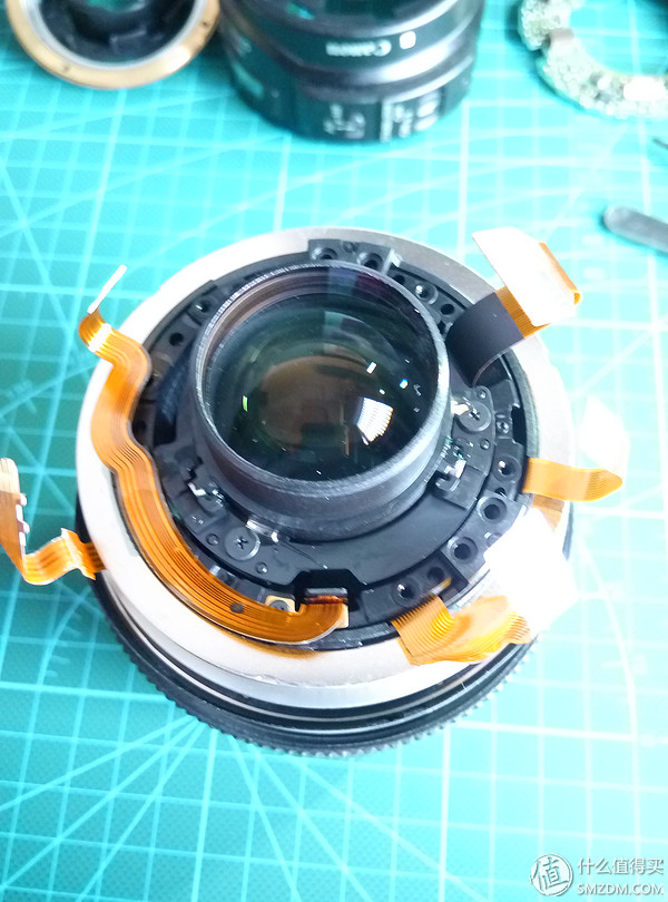 佳能相机广州维修中心_佳能镜头排线更换教程_对焦马达维修过程