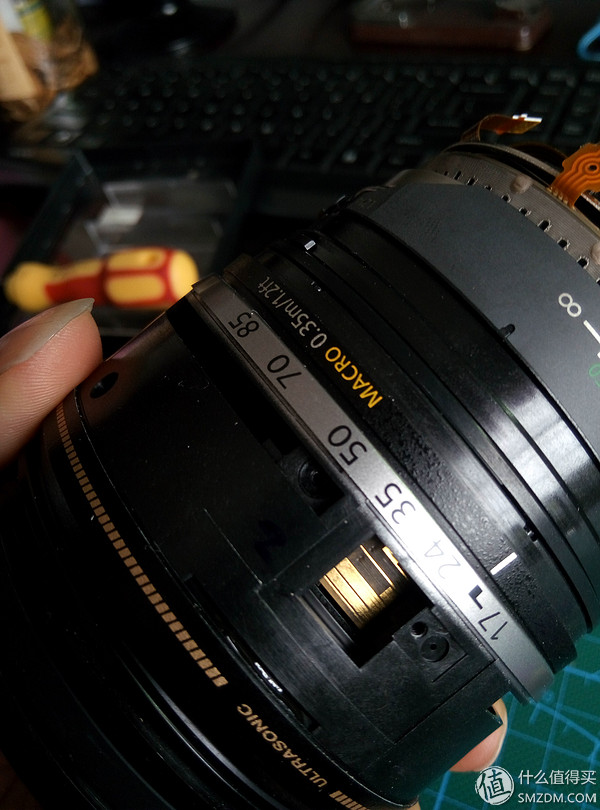 佳能相机广州维修中心_对焦马达维修过程_佳能镜头排线更换教程