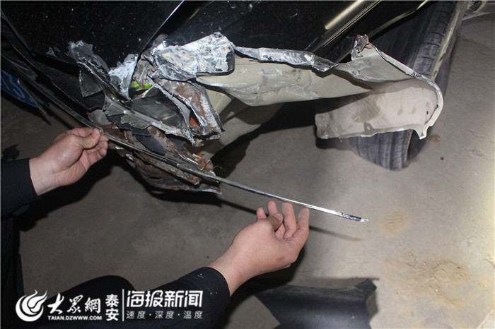 撞坏十几米护栏驾车逃跑 宁阳交警循迹找车半小时破案(图3) 宁阳县交警护栏被撞事故_桑塔纳高速错过出口倒车 后面车子无奈撞护栏_肇事逃逸桑塔纳轿车