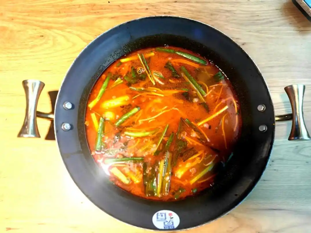 贵阳“三锅演义”!非遗美食煮沸筑城烟火气(图1) 贵州特色小吃介绍_贵阳酸汤牛肉_贵州非遗美食